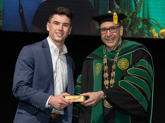 Photo of Connor Hapward and President Milo Riverso