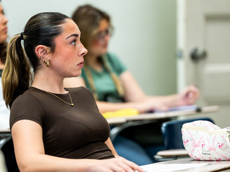Graduate student in class at Manhattan University