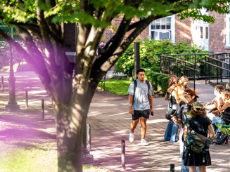 Manhattan University students walking on campus