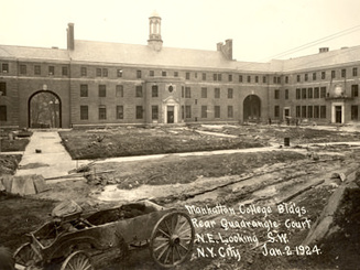 Construction of Manhattan College quadrangle buildings in Riverdale, New York City, during campus development in 1924.