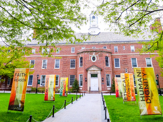 Mission Month banners in front of Kelly Commons