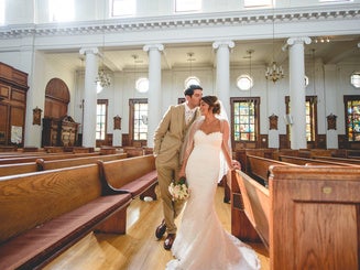 a bride and groom inside the Chapel
