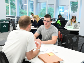 a student meets with an advisor
