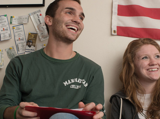 two students sit in a suite on the campus of Manhattan University