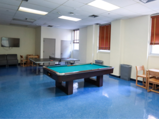 interior of a common space within Chrysostom Hall with a pool table
