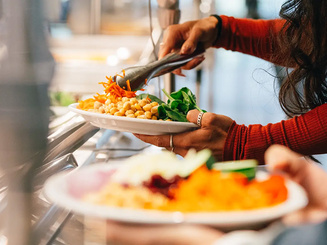 Image of students serving themselves from the dining hall.