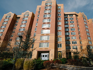 brick exterior of the multi-story Horan residence hall