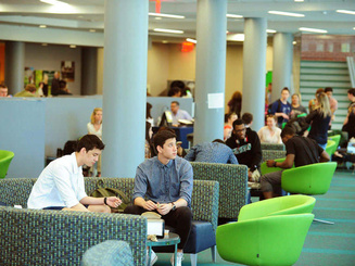 students sit in a common area