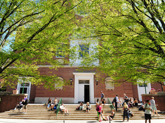 Image of students outside on the campus of Manhattan University
