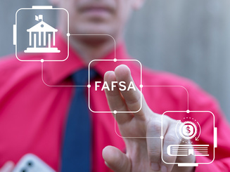 graphic showing a person pointing at a screen with graphics including one that says FAFSA