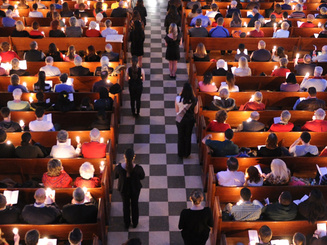view from above of people attending a religious service in a chapel