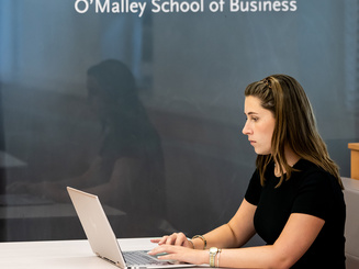 O'Malley School of Business student studying