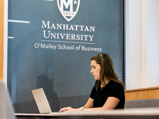 O'Malley School of Business student studying