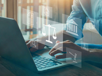 graphic of a person with a laptop and legal illustration graphics rendered on top of the image