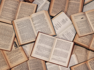 Overhead closeup shot of open books of literature