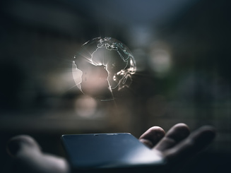 Earth hologram above smartphone screen