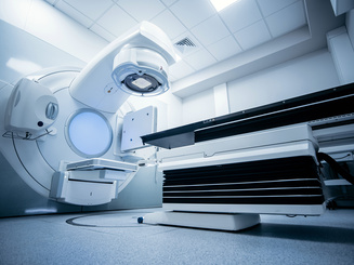 Linear accelerator for oncology treatment in a modern medical facility, showcasing advanced technology and equipment designed for patient care
