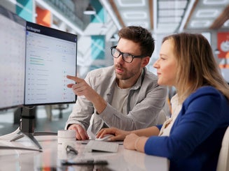 Cybersecurity Specialists Collaborating On Threat Analysis And Risk Management