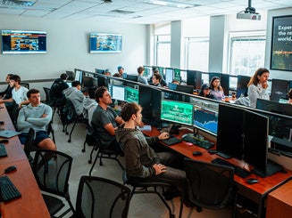 Bloomberg Trading room with business students for O'Malley School of Business