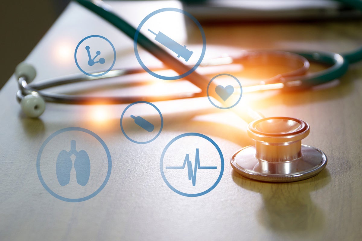 public health service image with a stethoscope with images of medical icons in front