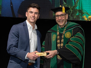 Photo of Connor Hapward and President Milo Riverso