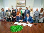 Photo of Manhattan College and St Francis College signing the new articulation agreement