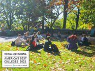 Students sitting on the quad with the Wall Street Journal College Rankings logo