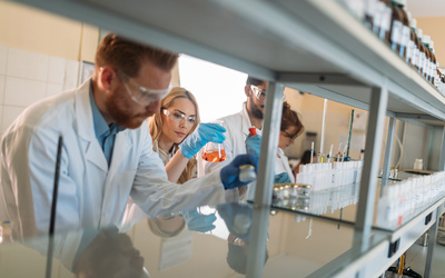 Manhattan University students of chemistry working in laboratory