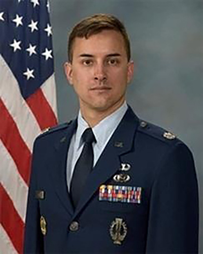 Official portrait of Lt. Col. Christopher Lovas, Operations Officer and Assistant Professor of Aerospace Studies at AFROTC Detachment 560, in U.S. Air Force dress uniform.
