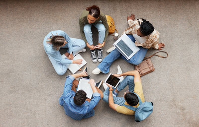 Group of Manhattan University students sitting in a circle