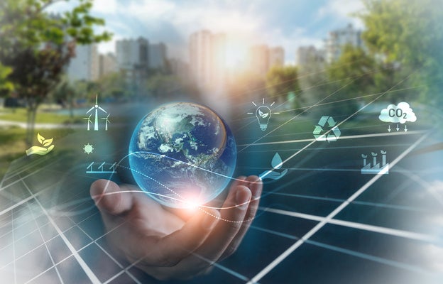 Hand cradling digital globe. global sustainability goals, green technology, corporate environmental responsibility cleaner planet. 