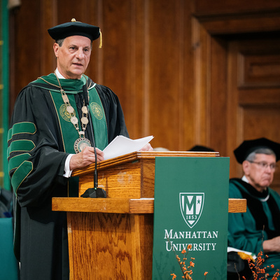 President Frederick Bonato delivers remarks at the podium during inauguration ceremony.
