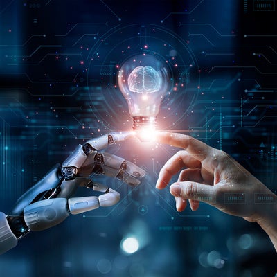 Hands of robot and human touch on big data network, Brain data creative in light bulb, Science and artificial intelligence technology, innovation for futuristic.